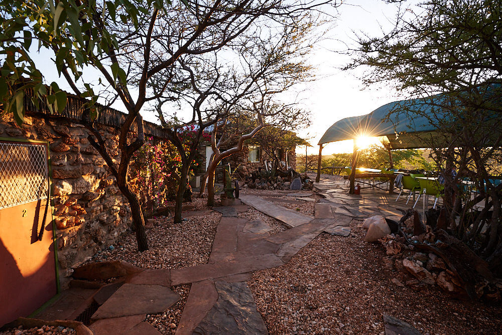 The picture shows the outdoor area of the guest accommodations in 'Camp Aussicht'.