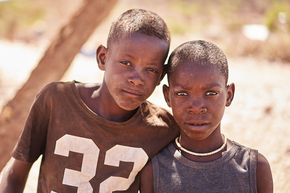 The picture shows two young Himba